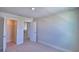 Cozy bedroom with carpet flooring, closet and a doorway to an adjacent room at 4538 Grandview Glen Dr, Auburndale, FL 33823