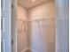 Walk-in closet features shelving for organized storage at 4538 Grandview Glen Dr, Auburndale, FL 33823