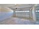 Spacious two car garage with automatic door and plenty of room for storage, tools, and vehicles at 4538 Grandview Glen Dr, Auburndale, FL 33823