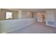 Open loft area with a view of the surroundings at 4538 Grandview Glen Dr, Auburndale, FL 33823