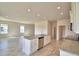 Bright kitchen featuring stainless steel appliances, granite countertops, and a large island with sink and dishwasher at 4538 Grandview Glen Dr, Auburndale, FL 33823