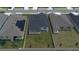 Backyard view of houses with fenced yards at 296 Spirit Landings Cir, Winter Haven, FL 33880