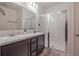 Clean bathroom with double sinks and a shower stall at 296 Spirit Landings Cir, Winter Haven, FL 33880