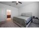 Main bedroom with a king-size bed and ensuite bathroom at 296 Spirit Landings Cir, Winter Haven, FL 33880