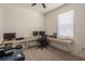 Bright home office features a built-in desk and ample space for two computer setups at 296 Spirit Landings Cir, Winter Haven, FL 33880