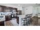 Dark kitchen cabinets with stainless steel appliances at 296 Spirit Landings Cir, Winter Haven, FL 33880