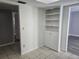 Bonus room featuring built-in shelving and tile flooring at 462 Cameo Dr # 462, Lakeland, FL 33803