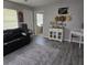 Cozy living room with modern furnishings and neutral tones at 462 Cameo Dr # 462, Lakeland, FL 33803