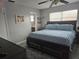 Bedroom featuring a plush bed with blue comforter and neutral walls at 462 Cameo Dr # 462, Lakeland, FL 33803