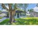 Beautifully renovated bungalow with fresh landscaping and a welcoming front entrance at 602 Taylor Blvd, Winter Haven, FL 33880