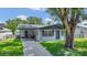 Charming single-story home featuring a well-maintained lawn and inviting entrance at 602 Taylor Blvd, Winter Haven, FL 33880