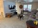 Relaxing living room with TV, comfortable seating, and a cozy atmosphere at 619 Cassandra Ln, Lakeland, FL 33809