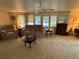 Spacious living room with ample natural light and comfortable seating at 619 Cassandra Ln, Lakeland, FL 33809