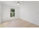 Bedroom with white walls and a window offering natural light at 1918 Dr Martin L King Jr Way, Haines City, FL 33844