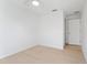 Bright bedroom featuring neutral tones and light wood flooring at 1918 Dr Martin L King Jr Way, Haines City, FL 33844