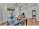 Spacious dining room with chandelier and sliding glass doors at 6857 Eagle Ridge Loop, Lakeland, FL 33813