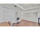 Hallway on second floor with hardwood floors, white doors and railings at 6857 Eagle Ridge Loop, Lakeland, FL 33813