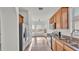 Kitchen featuring stainless steel appliances and eat-in dining area at 6857 Eagle Ridge Loop, Lakeland, FL 33813