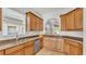 Kitchen with granite countertops, stainless steel appliances, and breakfast bar at 6857 Eagle Ridge Loop, Lakeland, FL 33813