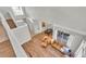 Open-concept living room featuring wood floors, leather furniture, and plenty of natural light at 6857 Eagle Ridge Loop, Lakeland, FL 33813