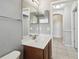 Bathroom vanity with a modern sink, neutral paint, and tile flooring at 1045 View Pointe Way, Lakeland, FL 33813