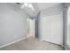 Cozy bedroom with a ceiling fan and a closet at 1045 View Pointe Way, Lakeland, FL 33813