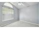 Cozy bedroom with natural light and neutral carpeting at 1045 View Pointe Way, Lakeland, FL 33813