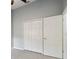 Bedroom with closet, carpeted flooring, neutral paint, and white trim at 1045 View Pointe Way, Lakeland, FL 33813