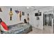 This bedroom features a ceiling fan, decor, a closet, and an adjacent door at 834 Auburn Preserve Blvd, Auburndale, FL 33823