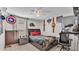 Bedroom featuring tile floors, a ceiling fan, and decorations at 834 Auburn Preserve Blvd, Auburndale, FL 33823