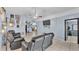 Living room displaying open floor plan, vaulted ceiling and tile floors at 834 Auburn Preserve Blvd, Auburndale, FL 33823
