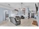 Cozy living room offering tile floors, ceiling fan and ample room for entertaining at 834 Auburn Preserve Blvd, Auburndale, FL 33823