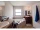 Bright bathroom featuring a soaking tub with tile surround and a double sink vanity at 1619 Prairie Blossom Dr, Lakeland, FL 33810