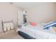 Guest bedroom featuring neutral walls and carpet, an adjacent door to the Primary bedroom, and a double bed at 1619 Prairie Blossom Dr, Lakeland, FL 33810