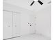 The bedroom has two closets and a ceiling fan at 1896 12Th St, Orange City, FL 32763