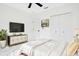 Modern bedroom with sleek marble floors, stylish decor, and a spacious closet at 1896 12Th St, Orange City, FL 32763