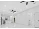 Bright living room showcases modern design with marble floors, white walls, and ceiling fan at 1896 12Th St, Orange City, FL 32763