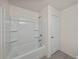 Bathroom featuring a tub and shower combination at 1029 Mattie Pointe Way, Auburndale, FL 33823