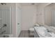 Bathroom featuring a shower/tub combo, toilet, and a single sink vanity at 1029 Mattie Pointe Way, Auburndale, FL 33823