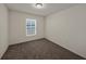 Simple bedroom with window and carpet at 1029 Mattie Pointe Way, Auburndale, FL 33823