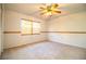 Bedroom featuring a ceiling fan and large window letting in natural light at 480 Nighthawk Dr, Lakeland, FL 33813