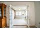 Bright sun room featuring paneled windows, ceiling fan and exposed brick wall at 480 Nighthawk Dr, Lakeland, FL 33813