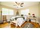 Spacious bedroom with hardwood floors and plenty of light at 7525 Catherine Dr, Lakeland, FL 33810
