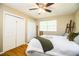 Comfortable bedroom with hardwood floors and double door closet at 7525 Catherine Dr, Lakeland, FL 33810