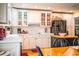 Bright kitchen with white cabinets, stainless steel appliances, and an island at 7525 Catherine Dr, Lakeland, FL 33810