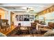 Living room with built-in shelving and a fireplace at 7525 Catherine Dr, Lakeland, FL 33810