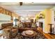 Living room with leather couch and coffee table at 7525 Catherine Dr, Lakeland, FL 33810