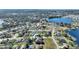 Home nestled in a quiet residential neighborhood near a lake at 206 Clovis Pass, Winter Haven, FL 33880