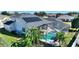 House with solar panels and a screened pool at 206 Clovis Pass, Winter Haven, FL 33880