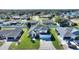 Aerial view of house and surrounding neighborhood at 206 Clovis Pass, Winter Haven, FL 33880